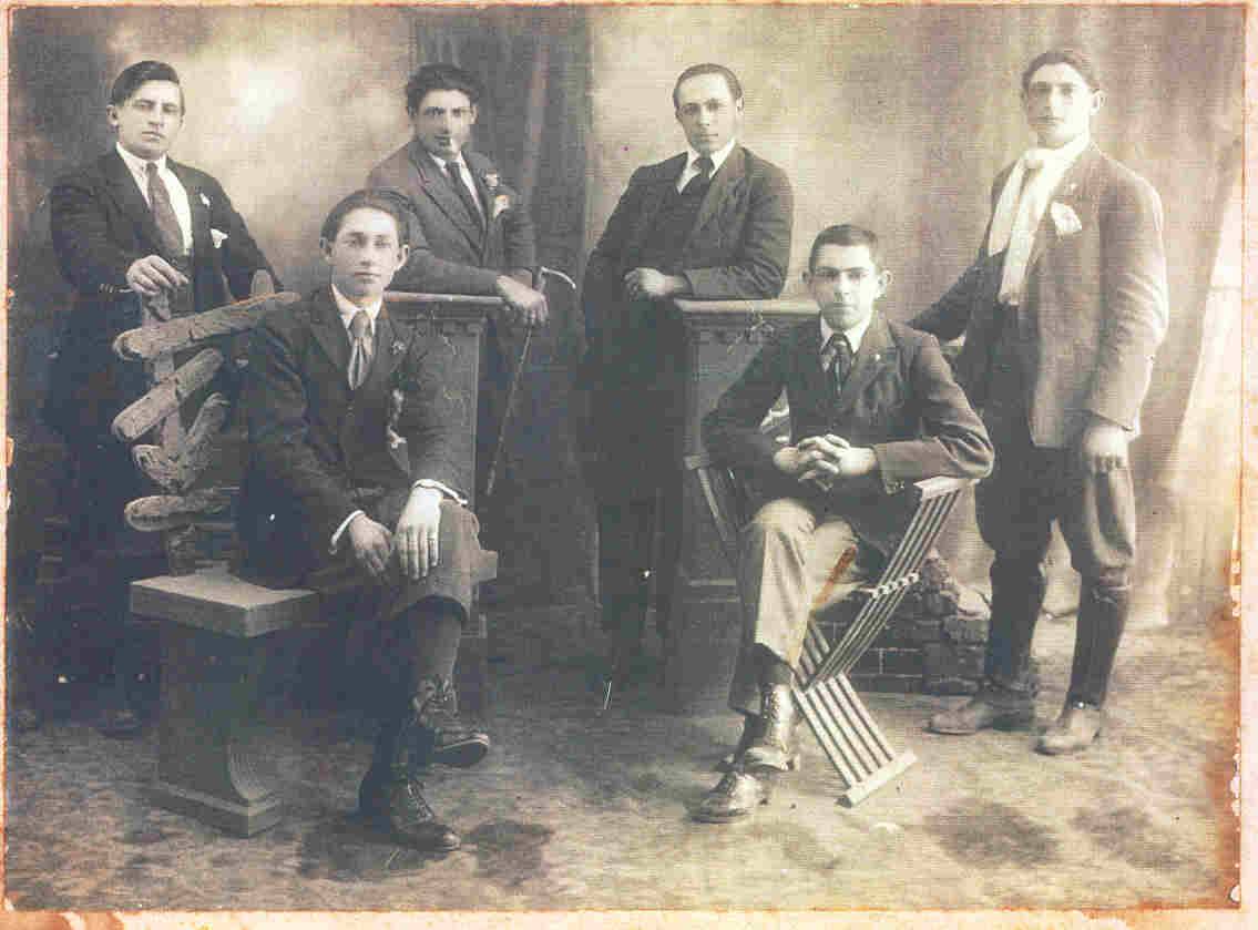 Six persons, photograph unknown